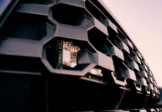 CALI RAISED 2016-2021 TOYOTA TACOMA GRILLE MOUN - CR2573